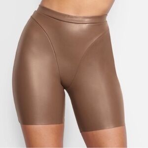 SKIMS Sculpting Faux-Leather Bike Shorts in Brown